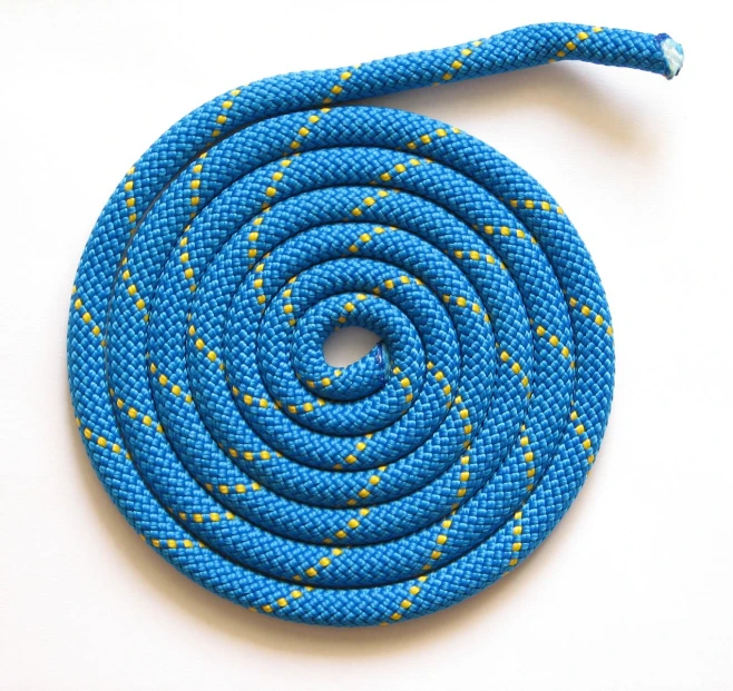 blue ropes with yellow dots sitting on a white surface