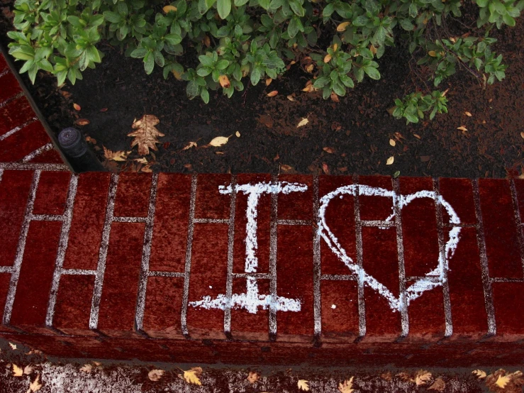 an older style sign painted on a brick wall