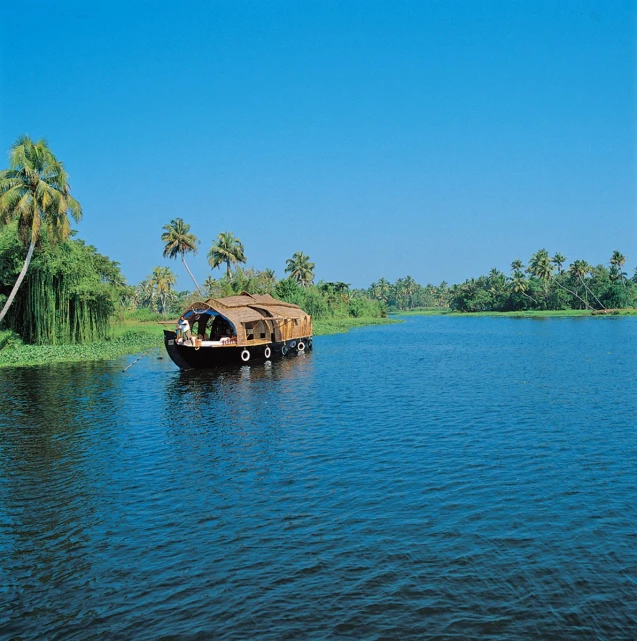 some boats and two people in them on water