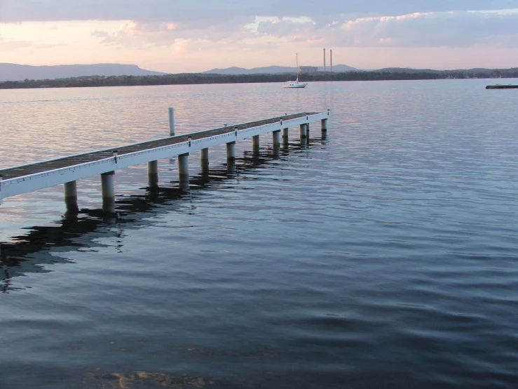 a dock line is in the water at the beach