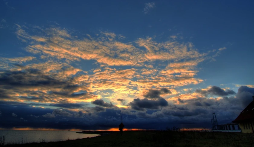 a man is watching the sky and water