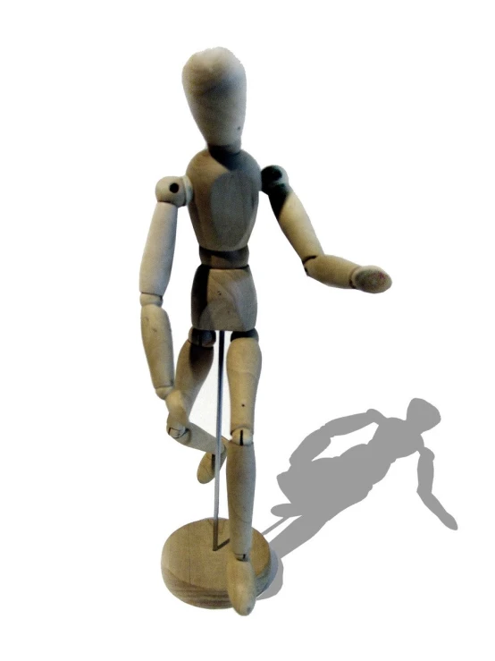 a mannequin is on a wooden base with a white background