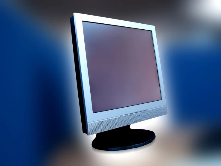 a small desktop computer monitor is sitting on a table