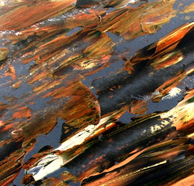 close up of an abstract painted surface with small ripples in it