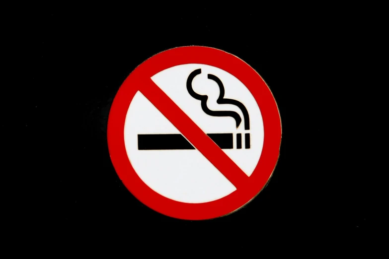 a no smoking sign is shown against a black background