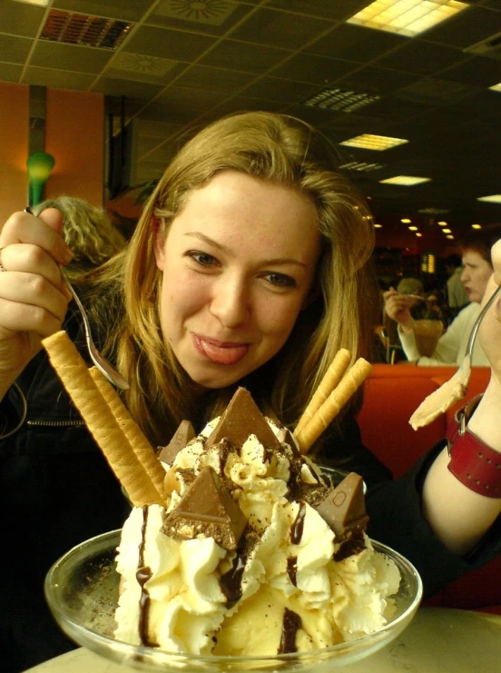 woman eating ice cream from an ice cream parlor
