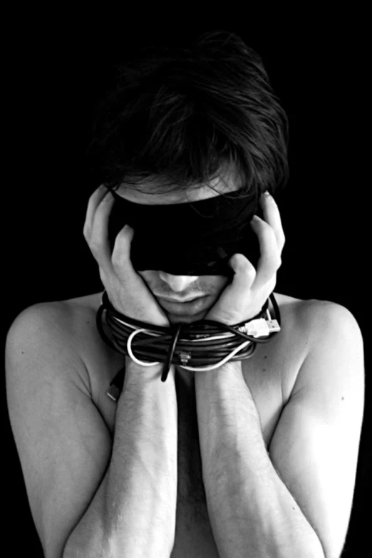 a woman wearing a blindfold covering her eyes