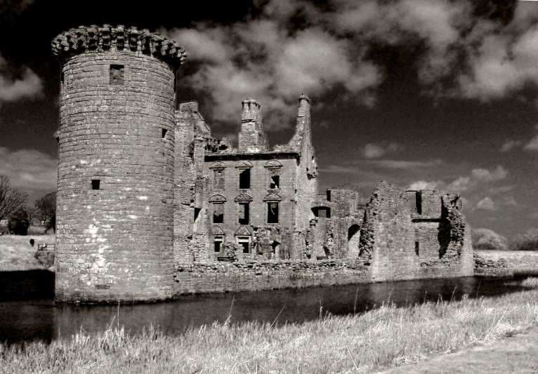 a black and white po of old castle ruins