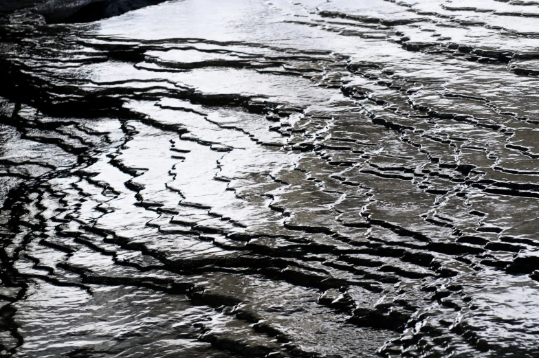 an abstract pattern in the water on top of land