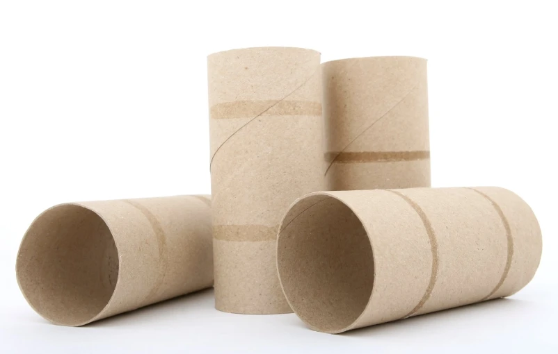 several cardboard tubes sitting next to each other