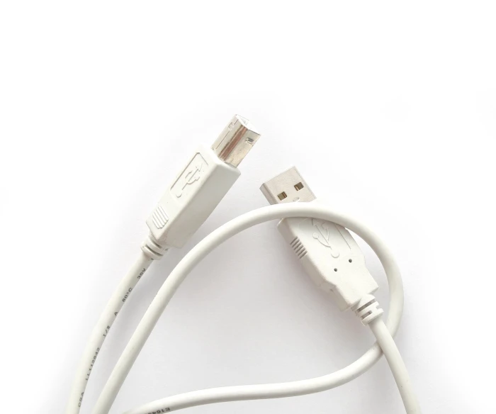 a usb cable is shown on a white surface
