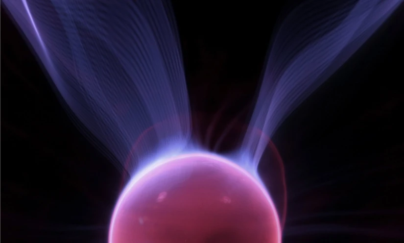 an artistic pograph of a ball of gas with blue smoke behind