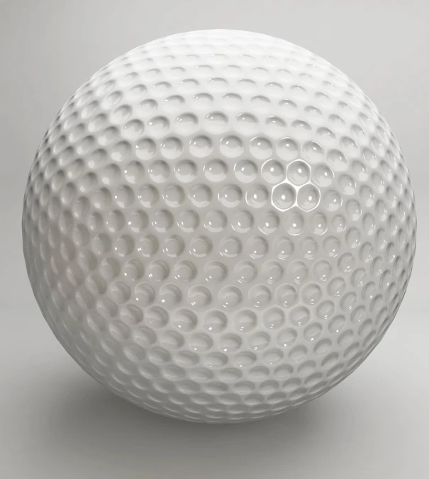 a close - up view of the golf ball, showing the intricately decorated structure