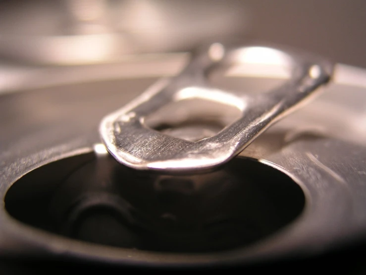 an empty silver pan sitting on a counter top