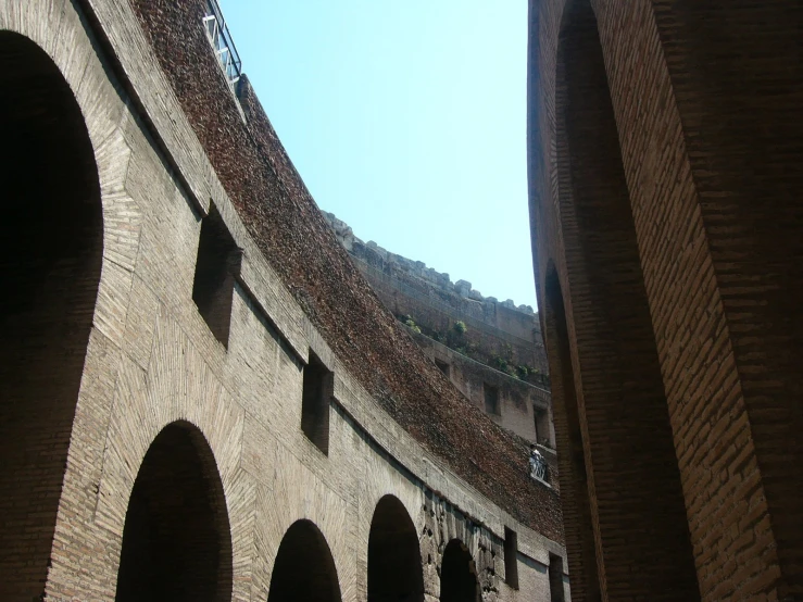 a close up s of a stone wall with arches