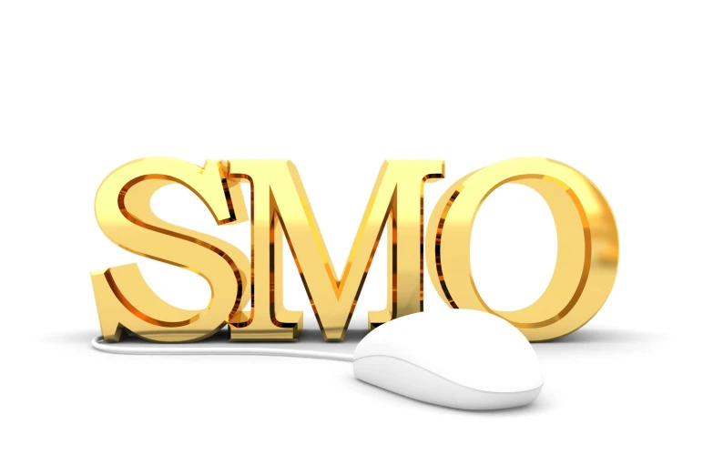 a computer mouse and a gold letter with the word smsm on it