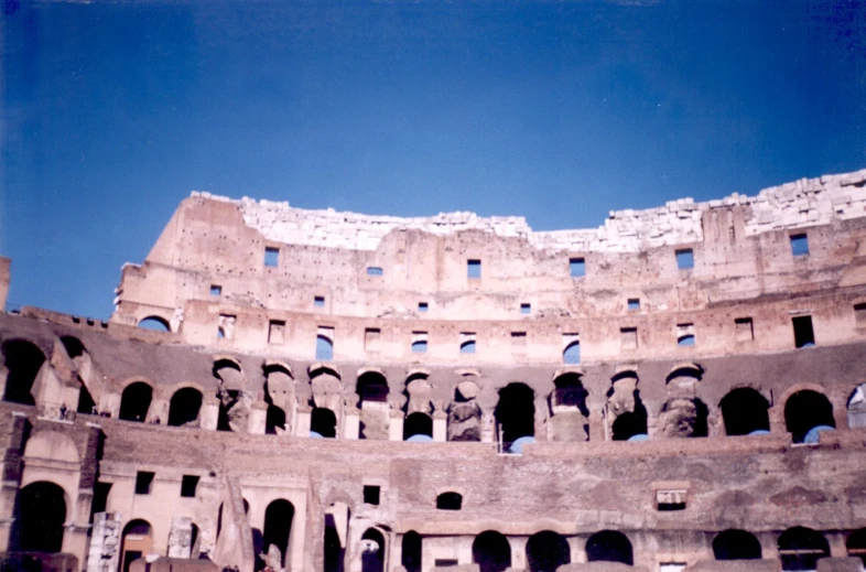 a large building has many stone walls