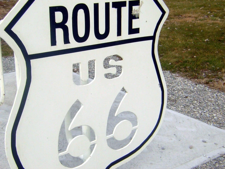 an image of a route 66 sign painted on concrete
