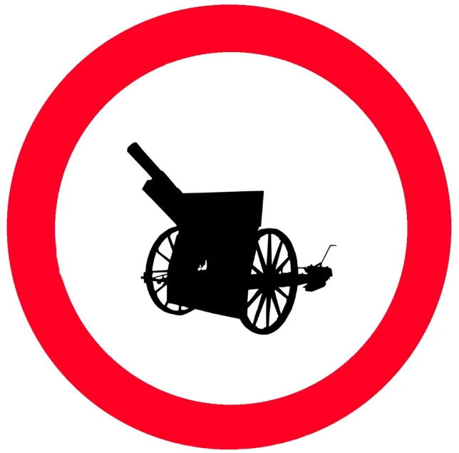 a circular sign has an image of a cannon