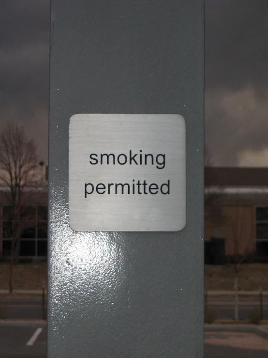 there is a sticker reading smoking permitted