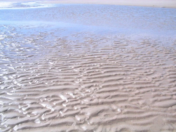 patterns in the sand on the beach