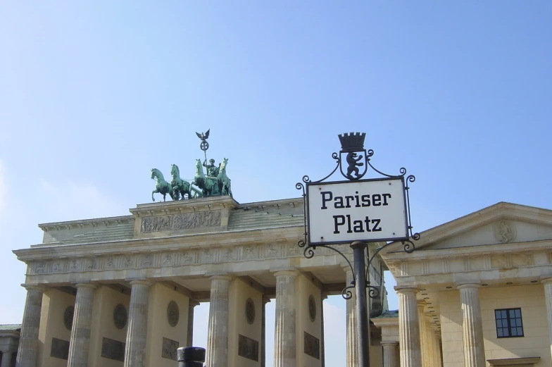 a white building with a sign that says farmer platz on it