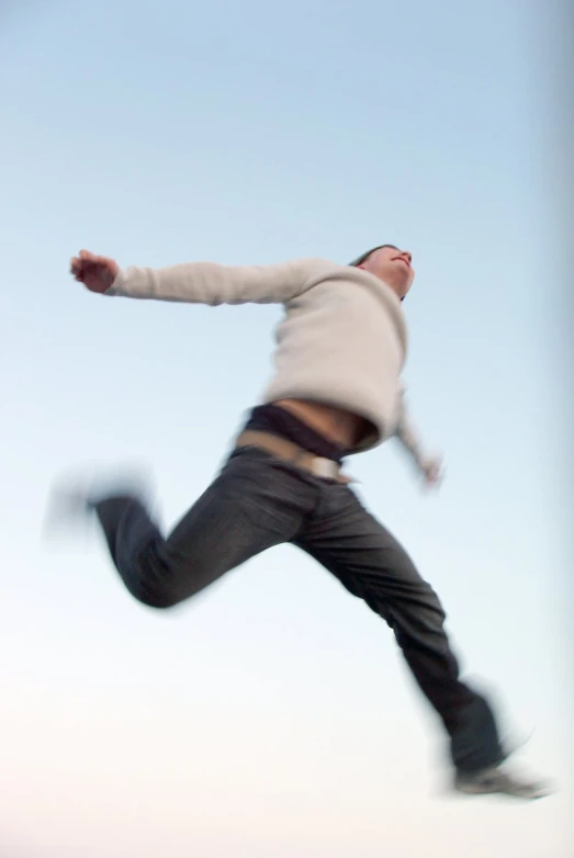 a man is jumping high in the air