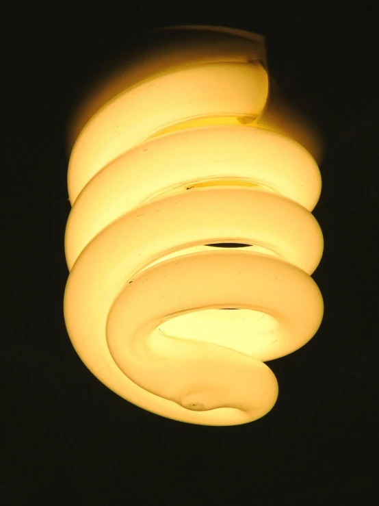 a close up of a lamp in the dark