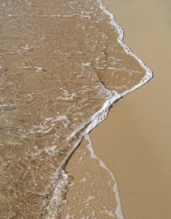 the top view of an empty beach with sand