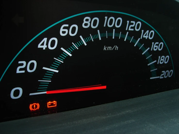 a meter showing the times on a car