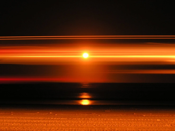 a blurry pograph with orange and yellow colors