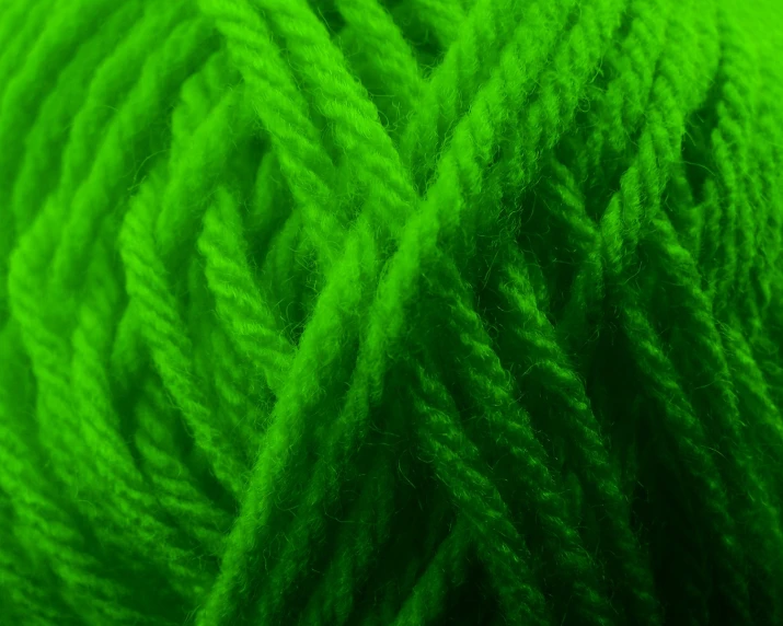 a close up s of a green ball of yarn