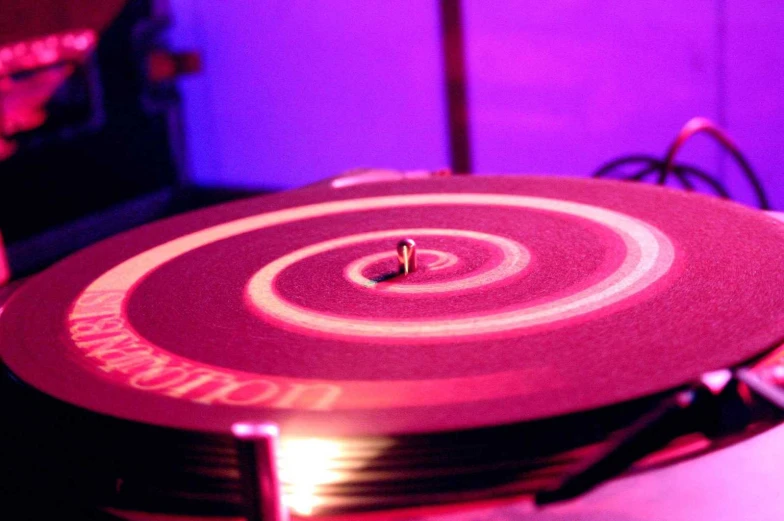 an item sits on top of the dj's turntable