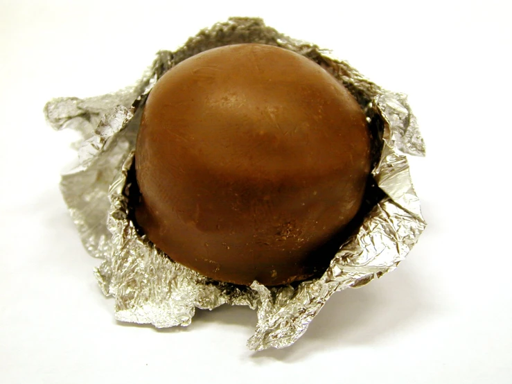 the large chocolate ball is on a piece of foil