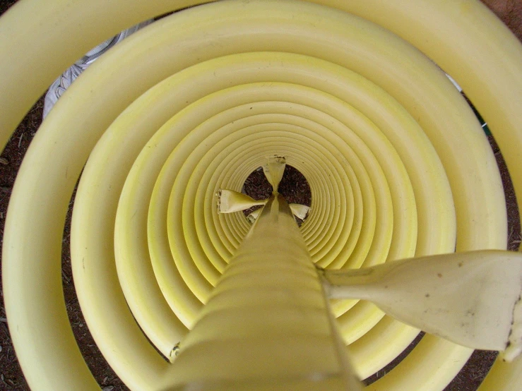 a po looking down into the bottom of a cone shaped structure