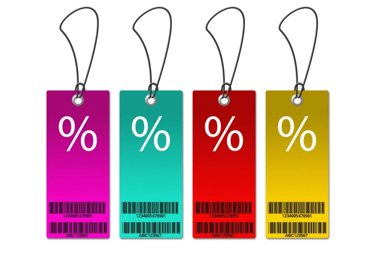 three tags with percentage prices hanging on string