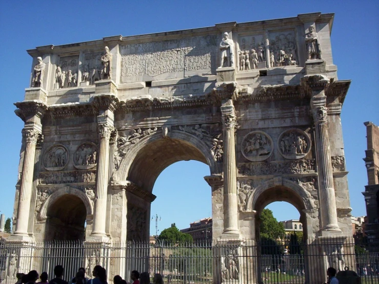 the arch of victory has many figures all around