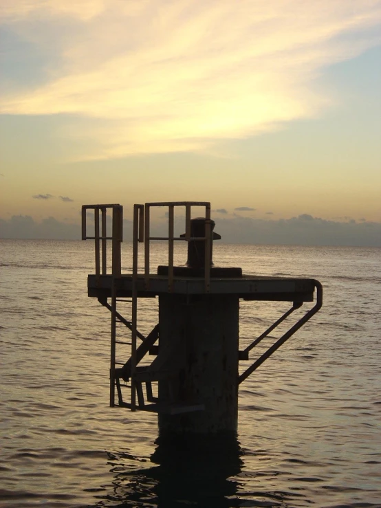 an image of the top of a water turbine at dusk