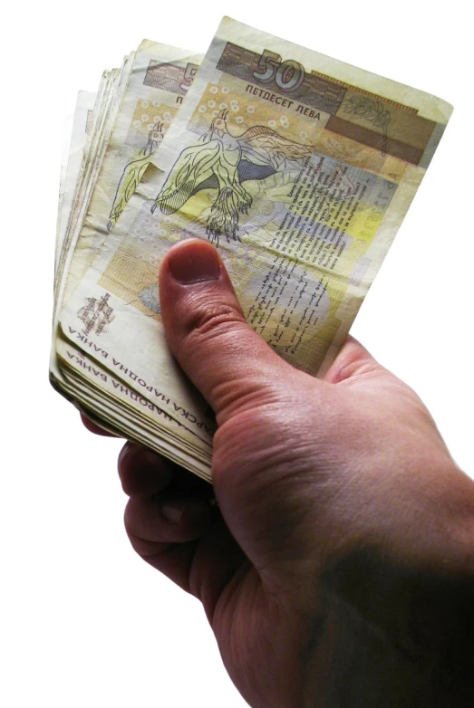 a man holding a stack of bank notes on his fingers
