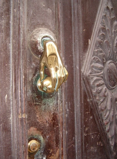 a large door handle on a big door