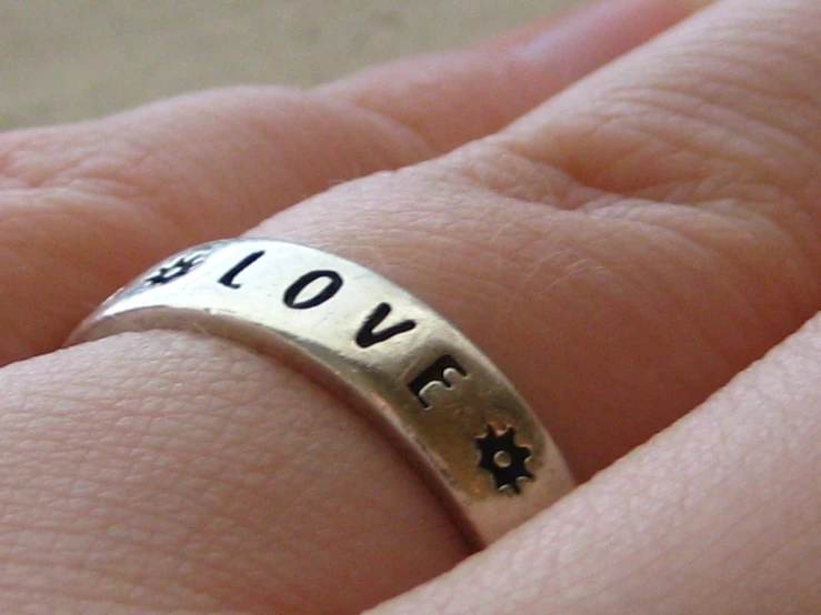 hand stamped sterling ring with i love us