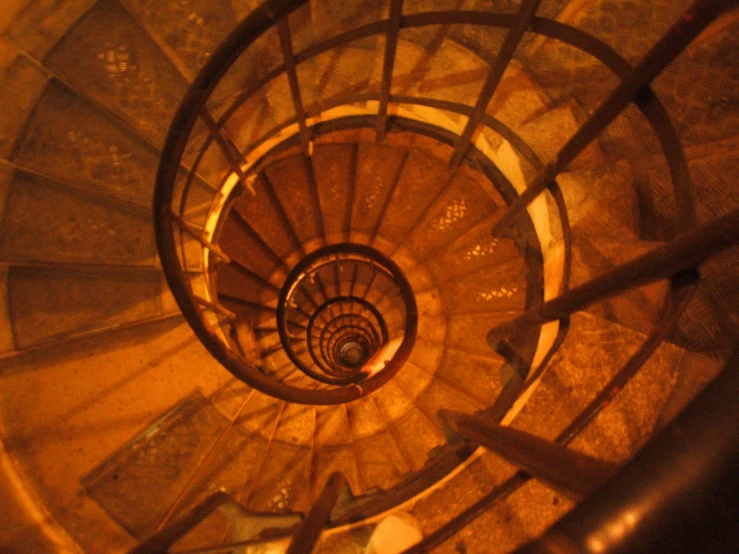 a view down into a spiral staircase