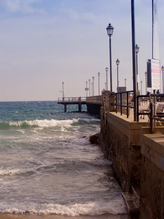 a pier that is in front of some water