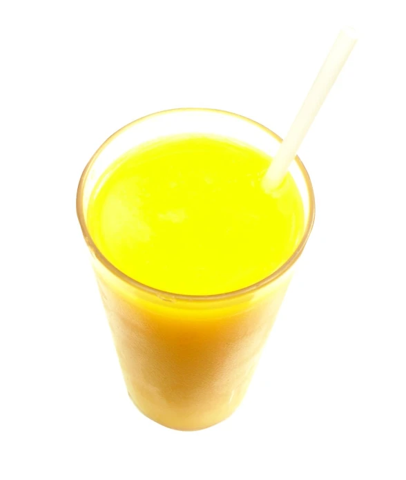 an orange juice is in a clear glass