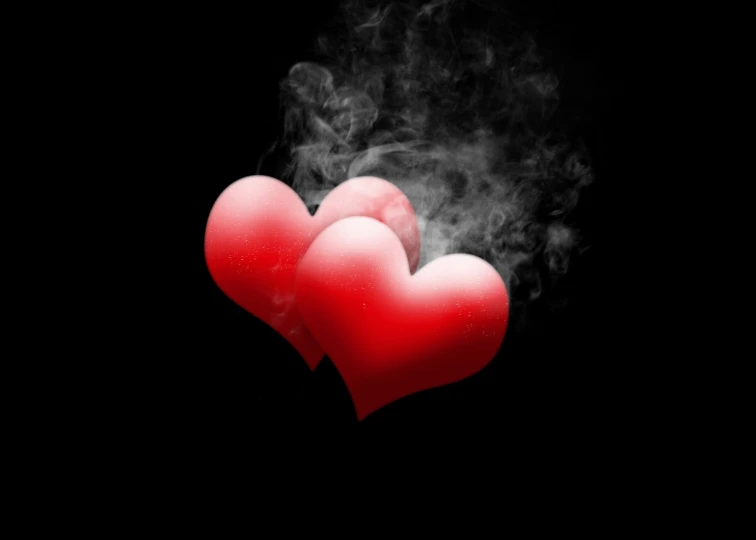 three smoke - filled hearts are arranged over a black background