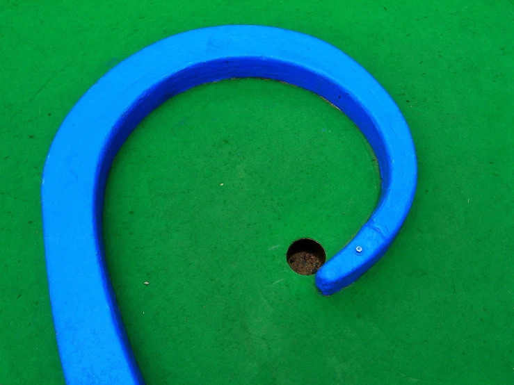 a rubber swimming tube that is laying on the ground