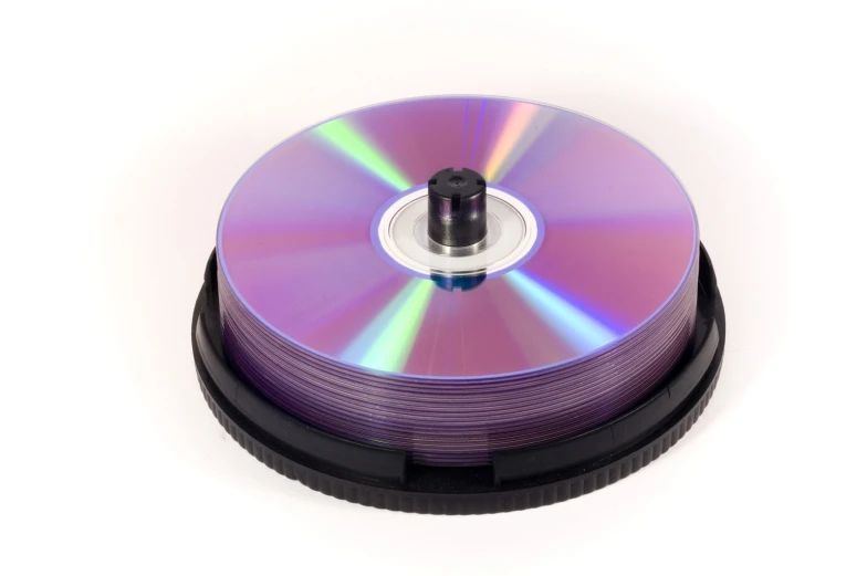 an open disc sitting on top of a small device