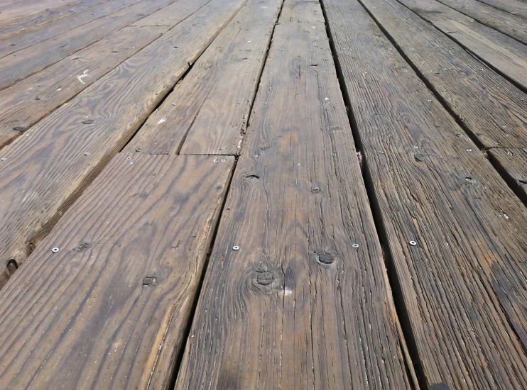 this is a closeup view of a wooden pier