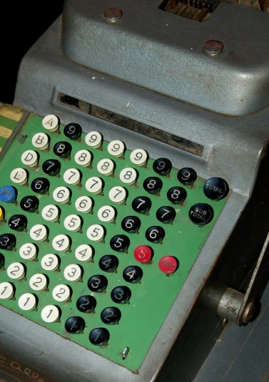 an old style green typewriter on display