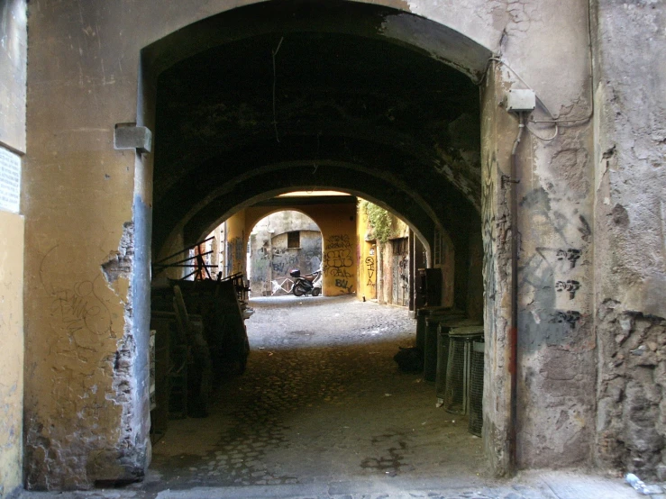 a po taken from a doorway looking at a passage between two buildings